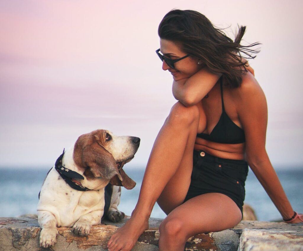 Woman and her Bassett Hound