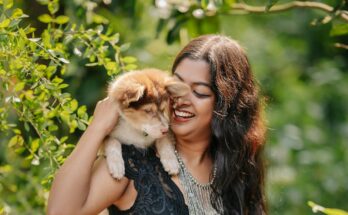 Woman and her Australian Shepherd Puppy